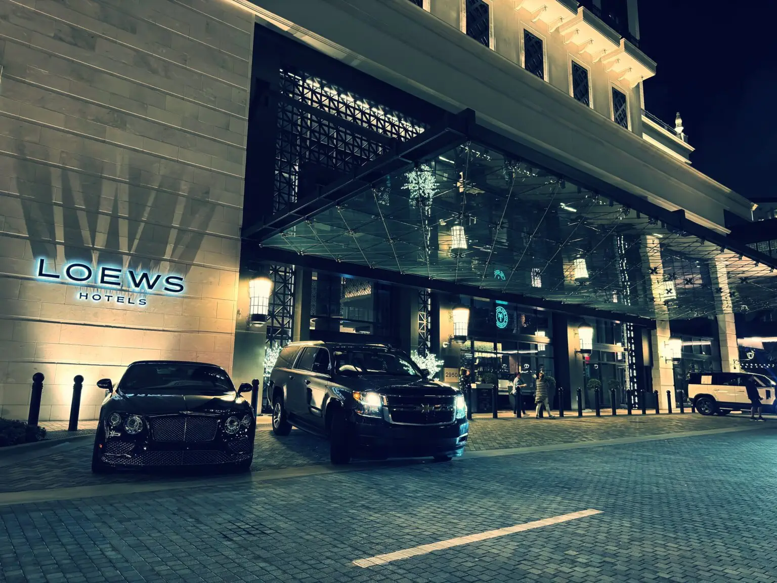 SUV parked in front of Loews Hotel in Coral Gables, representing Miami Premier Transportation’s luxury hotel transfer services